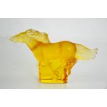 A Rene Lalique Kazak glass amber horse, etched Lalique. 11.5cms x 18cms