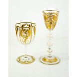 Two gilded glasses, one with knopped stem, the other with quatrefoil form body.