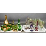 A group of Bohemian glassware, glasses with spiral decoration and scent bottles