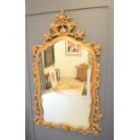 A 19th century style gold painted wall mirror143cm by 79cm