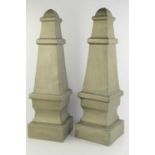 A pair of painted tin obelisks77cm
