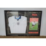 A framed England football shirt, signed by Paul Gascoigne with certificate of authenticity114cm by