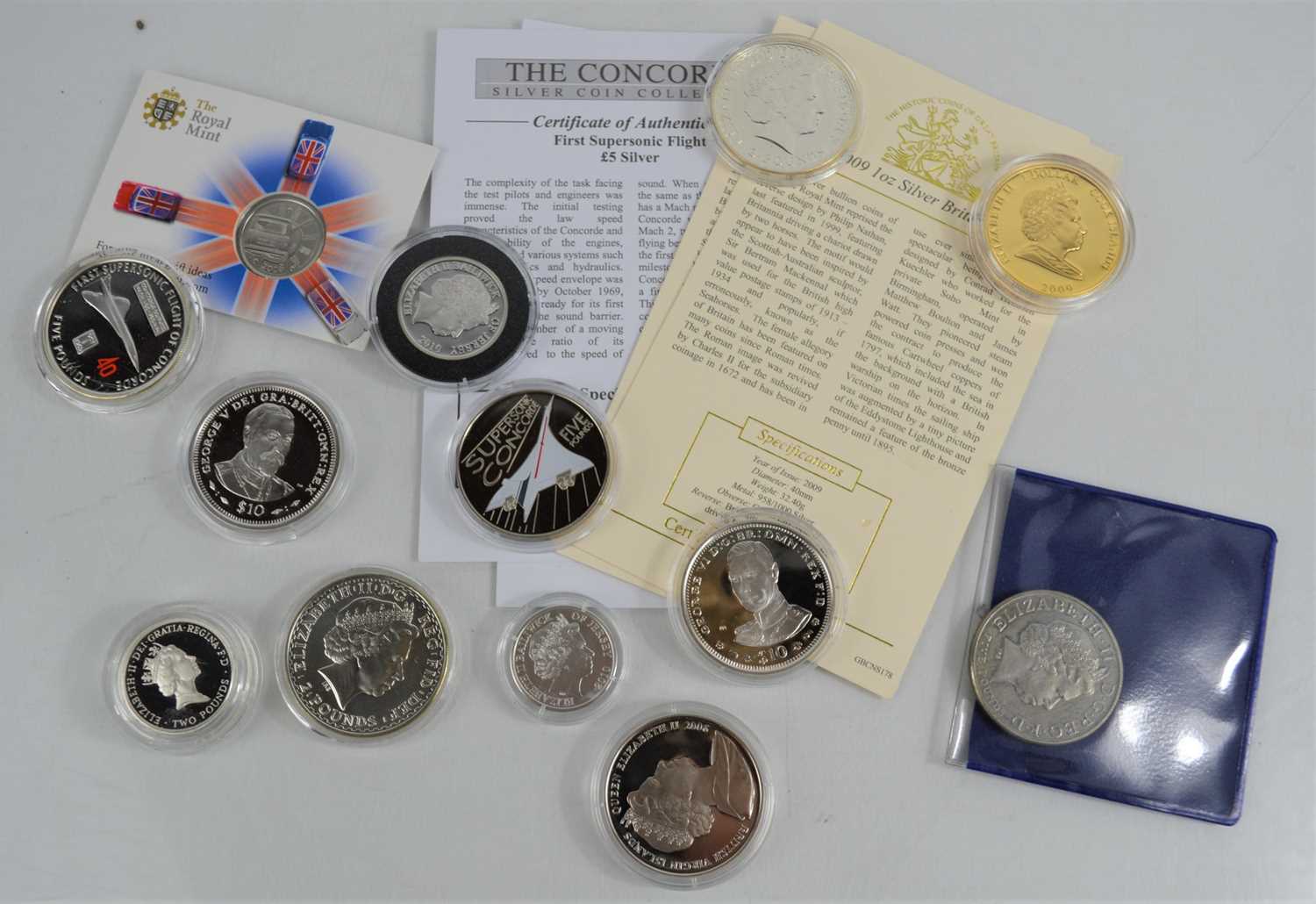 A group of ten silver proof coins to include supersonic Concorde, 2009 Britannia, Virgin Islands $10