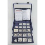 A collection of Royal Canadian mint silver $20 dollar coins in presentation case
