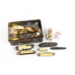 A group of collectables to include porcelain doll tops, button hooks, five vintage pen knives and