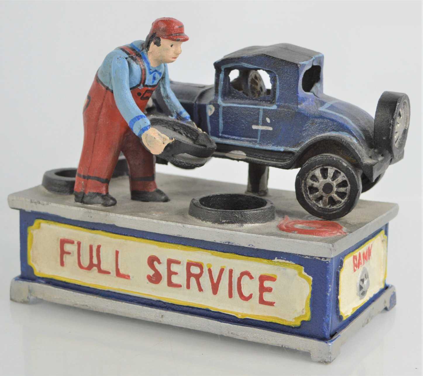A cast iron novelty "Full Service" money box