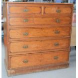 A large Victorian pine chest of drawers, inlaid decoration to top and front