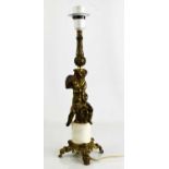 A gilt metal and agate table lamp in the form of a cherub.41cm high.