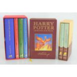 Harry Potter deluxe gold signature 1st edition hardback book box set, some books are still sealed