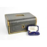 A Victorian leather clad jewellery box with inner compartmented tray, together with a Victorian