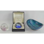 A Caithness limited edition glass paperweight together with an unamed example and a Italian studio