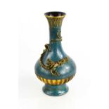 A 20th century Chinese vase, modelled with a dragon to the neck, on a turquoise/blue ground,20cm