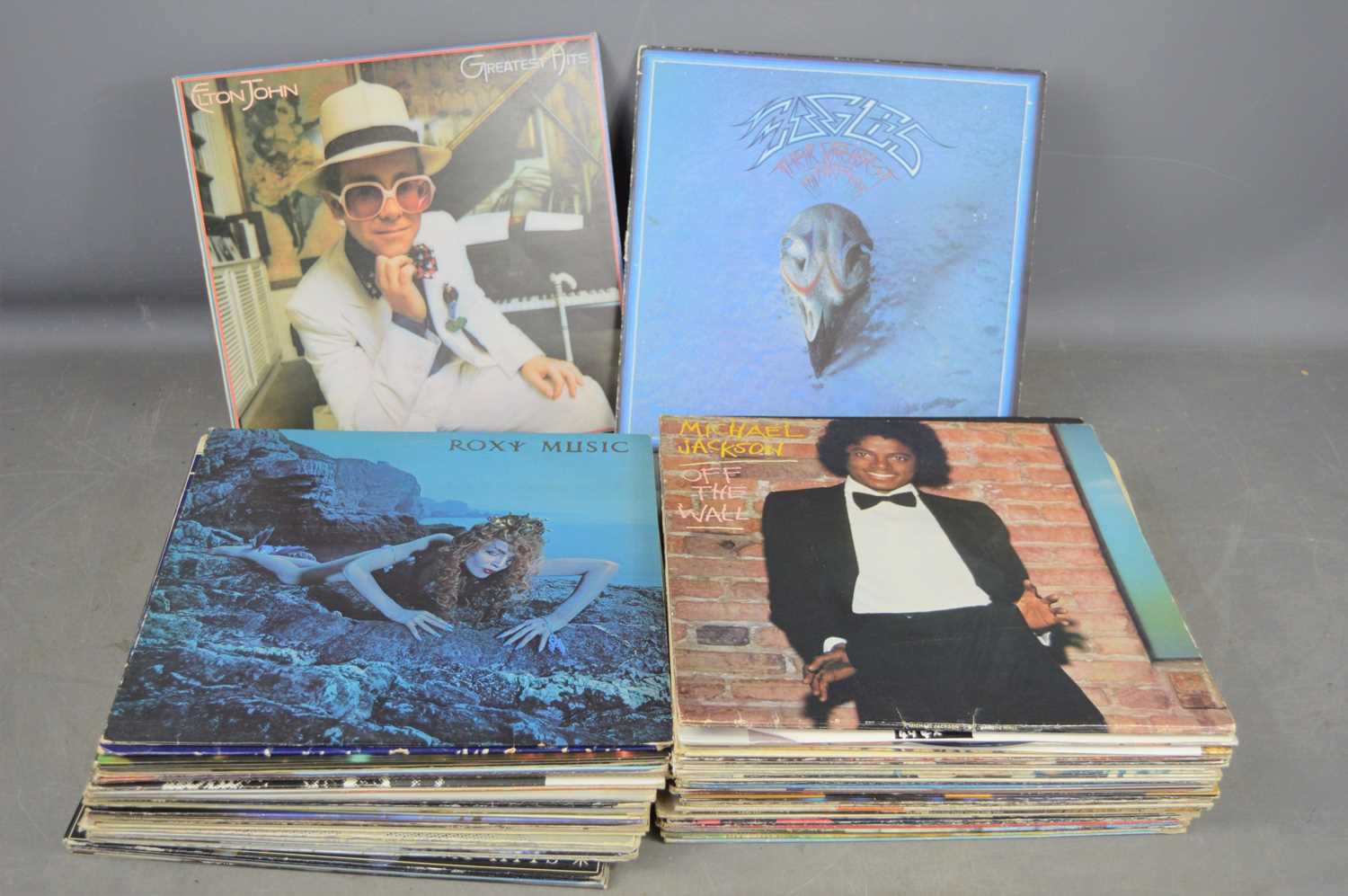 A group of vinyl record albums to include Rod Stewart, Roxy music, Diana Ross, Bryan Ferry