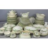 A Royal Doulton dinner tea service in the "Countess" pattern to include tureens, meat platters,