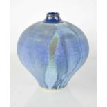 A Studio pottery vase, with blue matt glazed body and cobalt blue glazed rim, bearing stamped makers