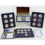 Iconic London and remebering the 1960s Numisproof coin collections together with the arms of the