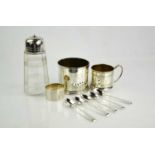 A group of silver to include five teaspoons, a machine engraved napkin ring, silver topped sifter,