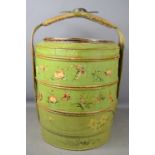 A 20th century green three tier Chinese wedding basket, decorated with flowers and butterflies63cm