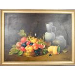 I Langella (20th century): an Italian oil on canvas, still life with fruit.69 by 49cm