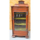 An Edwardian mahogany music sheet cabinet.