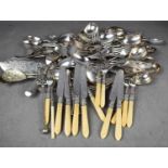 A quantity of silver plated flatware, to include a set with bone handles.