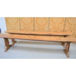 Two antique elm benches, slim discorectangle top, and exposed joints234cm wide by 48cm high