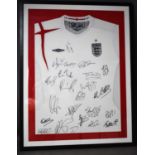 A signed England shirt, signed by twenty two players, framed. 93 by 73cm.
