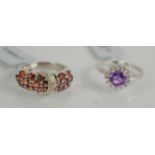 A Rajasthan garnet and white topaz silver ring together with Zambian amethyst and white topaz silver