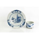 A 19th century Chinese blue and white dish, depitcting a house in landscape, 23cm diameter, together