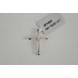 A 9ct white gold crucifix pendant set with diamonds, limited edition of 80 pieces, 1.28g