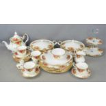 A Royal Albert part dinner / tea service in the old country roses pattern to include plates, serving