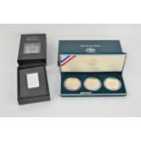 A U.S veterans commemorative silver proof dollars set together with a Lincoln memorial silver bar