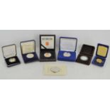 A group of commemorative silver proof coins and medals to include The Marriage of Prince of Wales