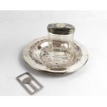 A silver topped glass dressing table pot, engraved with floral decoration, together with a Georg