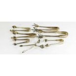 A group of silver plated sugar tongs, and a continental pair of silver tongs with reflex mechanism.