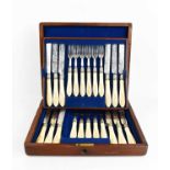 A fine set of 19th century solid silver and ivory handled knive and forks, in the original