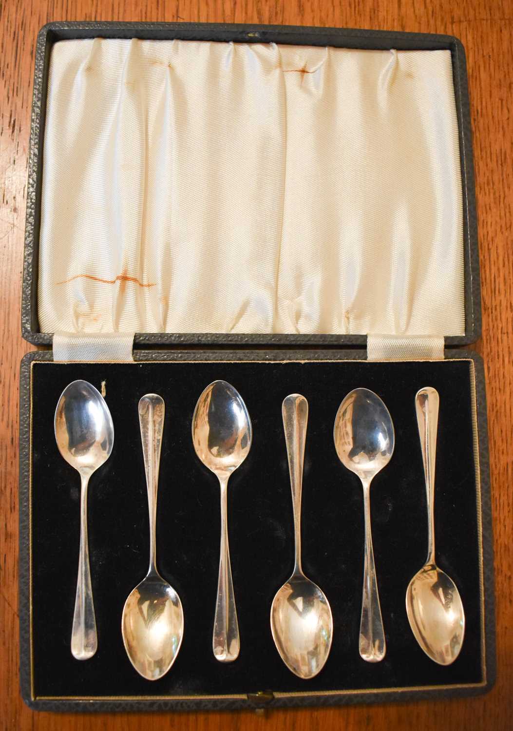 A set of silver teaspoons, 1.83toz in the original presentation box, Birmingham 1937