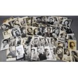 A large quantity of early 20th century and later black and white signed photographs of film stars