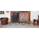 A large copper coal bucket circa 1900 together with a copper coal scuttle together with a fireside