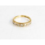 A 9ct gold and diamond half hoop eternity ring, size M, 2g.