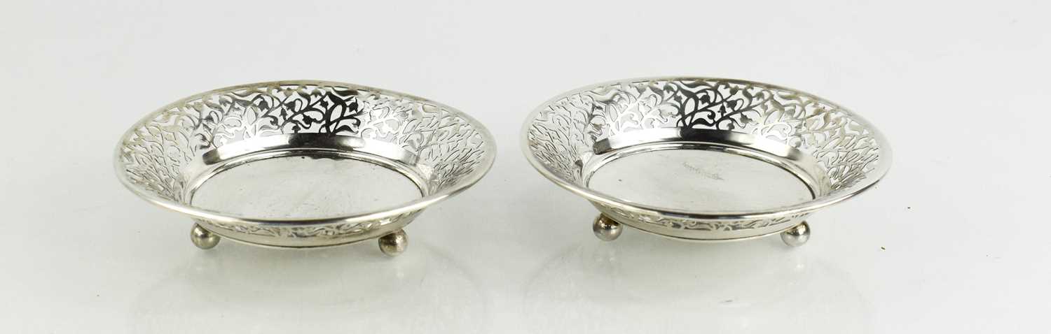 A pair of silver W Greenwood & Son dishes with pierced decorative edges, 2.8toz.