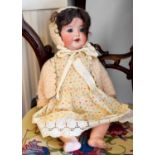 An Armand Marseille of Germany porcelain headed doll, numbered 996