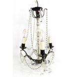 A three branch and cut glass clad chandelier. *Please note this item is at our Stamford sale room*