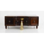 A late 18th / early 19th century walnut and elm table cabinet, with break front central drawer