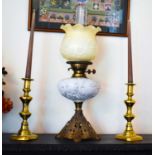 A Victorian paraffin oil lamp with opaque glass bowl and shade together with a pair of brass