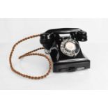 A vintage bakelite telephone labelled call exchange, in working order,