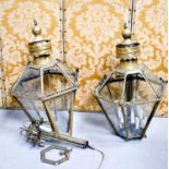 A rare pair of large gilt brass 19th century lanterns, one A/F.