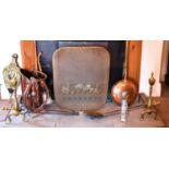 A quantity of antique copper and brass ware to include warming pan, coal scuttle, andirons and