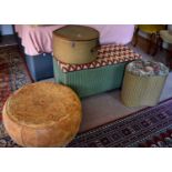 A Lloyd Loom style ottoman and linen basket together with a Moroccan stool and vintage hat box.