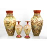 A pair of Doulton Lambeth stoneware Slaters patent baluster-shaped vases, floral pattern,